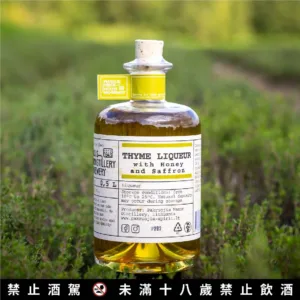a bottle of liquor in a field